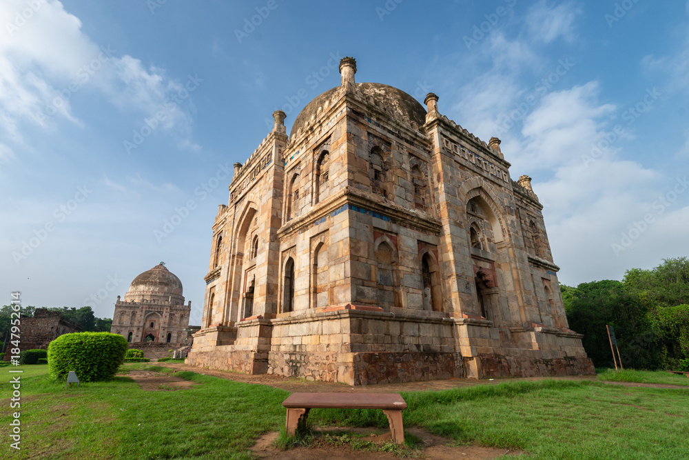 Fototapeta premium Lodi Gardens - New Delhi, India. The park spreads over 90 acres (360,000 m2), it contains Mohammed Shah's Tomb, the Tomb of Sikandar Lodi, the Shisha Gumbad and the Bara Gumbad.