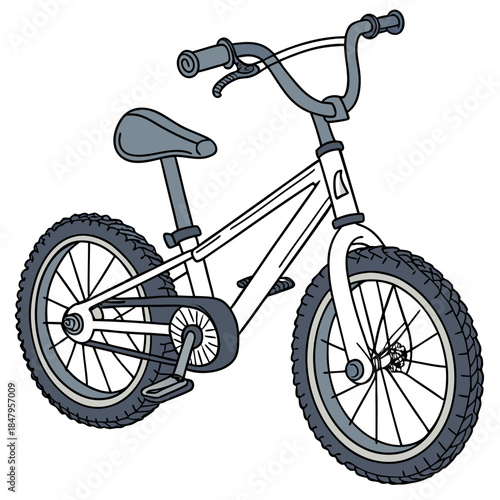 Small white childrens bike with black seat and tires