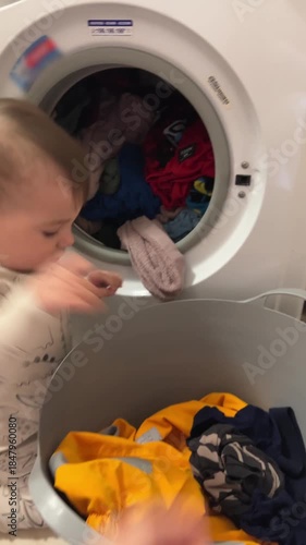 Toddler Helping with Laundry