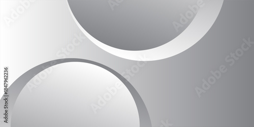 A minimalist abstract background featuring overlapping curves and circular shapes in various shades of gray, creating a smooth gradient and subtle depth