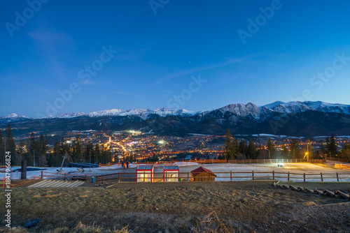 Fototapeta Naklejka Na Ścianę i Meble -  Tatry mountains near Zakopane at blue hour seen from Gubalowka hill. Poland