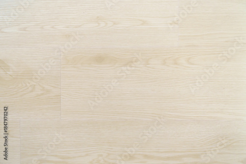 Seamless light-colored wood grain flooring