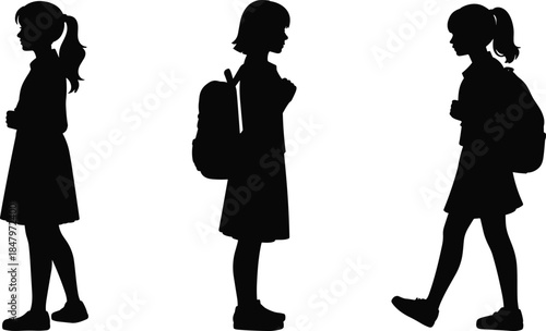 Schoolgirls silhouettes vector illustration showing children with backpacks standing and walking, education lifestyle concept, minimalist black student design