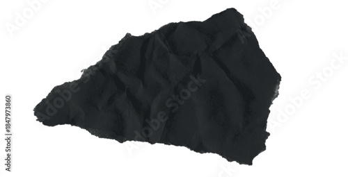 A shredded, crumpled page of black paper. Isolate against a white backdrop. ragged, dusty creases. Regarding titles and design