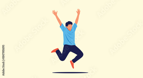 Excited young man jumping in the air with his arms raised, expressing pure joy, freedom, and success against a solid color background.