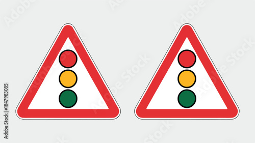 Two identical red triangular road warning signs with white borders and black outlines 