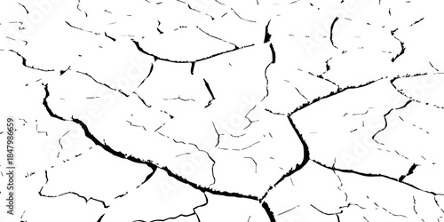 High-contrast black and white cracked earth texture with dry soil plates and sharp fissures. Ideal for drought, climate change, environmental damage, abstract backgrounds, and minimal graphic design p