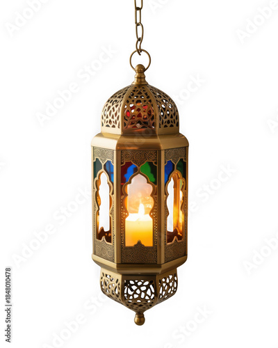 Ornate brass lantern with stained glass panels and a glowing candle inside against a white background isolated on transparent background
