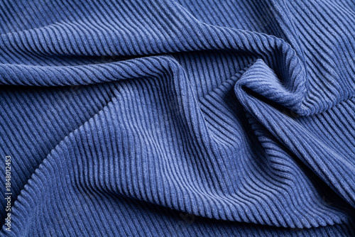 Blue ribbed corduroy texture background