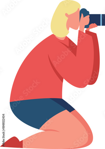 Woman crouching using a camera for photography