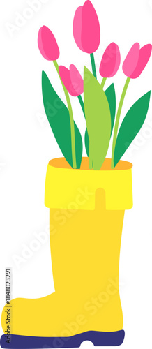 Yellow rubber boot container holding pink blooming tulips