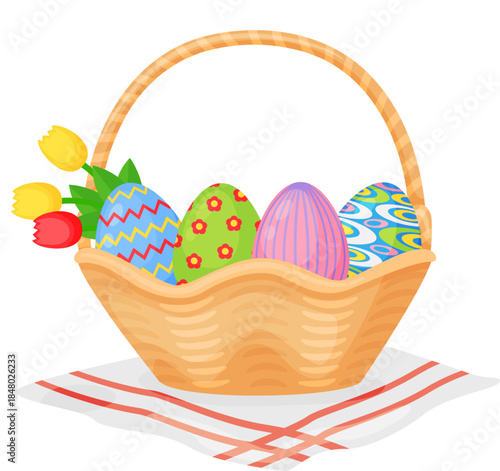 Easter basket filling with decorated eggs and spring tulips