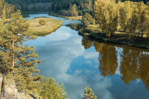 A beautiful lake with trees in the background
