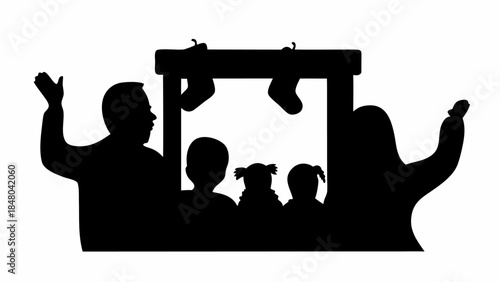Silhouette of family hanging Christmas stockings on mantle