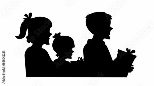 Silhouette of happy family with child receiving a gift