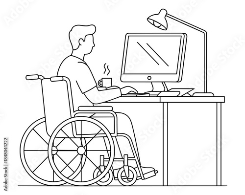Man in wheelchair working at desk with computer