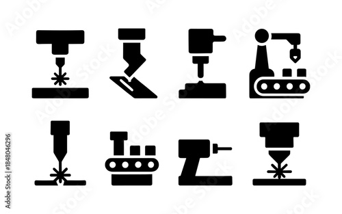 Set of industrial automation and manufacturing machine icons in solid black style