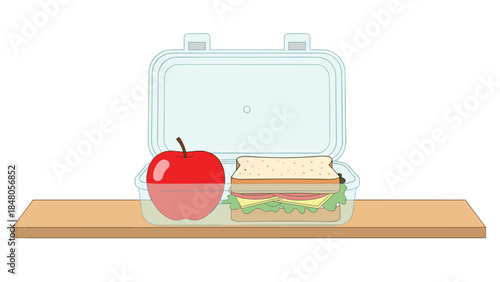 A colorful lunchbox contains a bright red apple and a delicious sandwich, ready for a midday meal or school break.