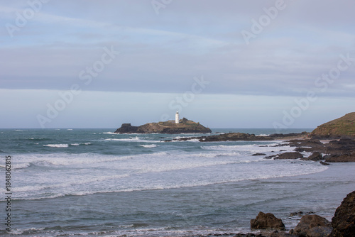 Godrevy Lighthouse at Godrevy Beach in Cornwall, UK.