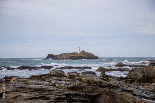 Godrevy Lighthouse at Godrevy Beach in Cornwall, UK.