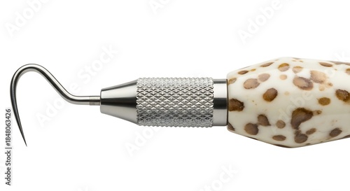 A studio close-up of a stainless steel dental explorer tool featuring a knurled metal grip and a white handle with brown leopard-style spots, isolated against a white background.
