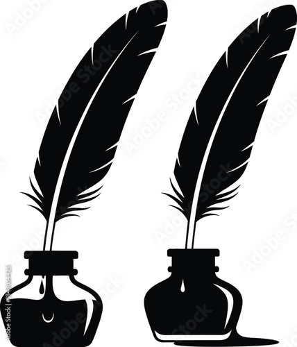 Two quill pens in ink bottles