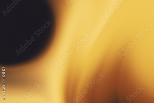 Golden amber and warm glow grainy gradient blur background. Cinematic luxury abstract background.