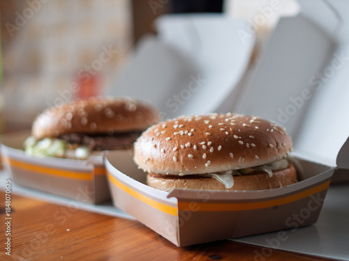 Delicious Fast Food Burgers in Takeout Boxes