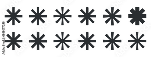 a black and white image displays a repeated pattern of symmetrical star shaped floral or asterisk like designs arranged in rows