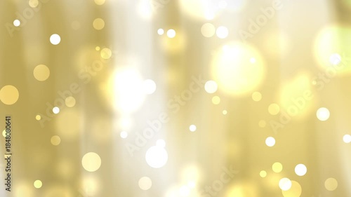 Golden bokeh lights on soft background for dreamlike effect. Suitable for holiday, festive, fantasythemed designs, or dreamy social media graphics.