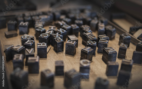 Foto Close up on the metal type pieces for the printing press