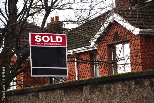 house sold sign