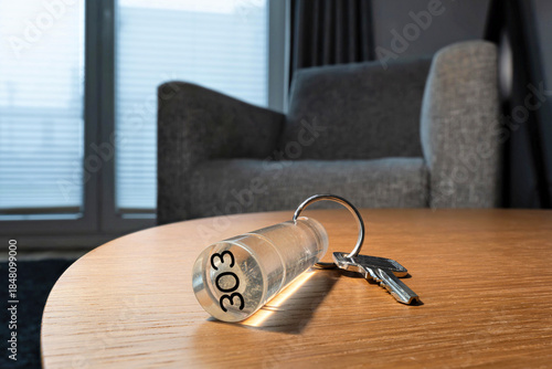 hotel or apartment key on table