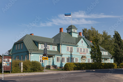 KADRINA, ESTONIA - AUGUST, 15, 2024: Historic wooden building with traditional architecture photographed in sunlight.