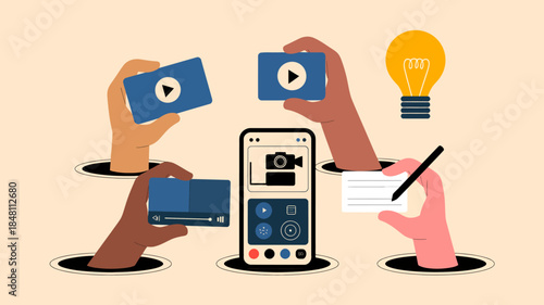 Hands holding video cards and phone with creative tools