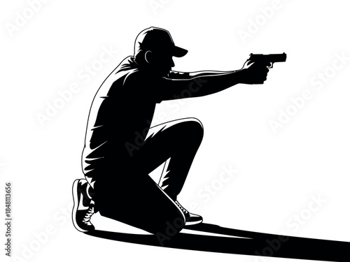 Silhouette of Man Kneeling Aiming Gun