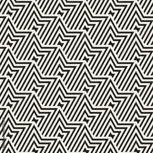 Vector seamless geometric pattern. A geometric pattern featuring alternating zigzag shapes in black lines on a light beige background, creating a visually striking repetitive design.