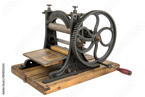 Well-preserved vintage cast iron printing press on a wooden base, a classic piece of industrial history and traditional letterpress technology