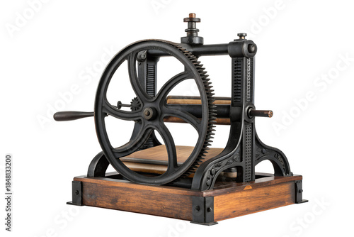 Antique printing press with large gear and wooden base, showcasing historical craftsmanship and industrial heritage