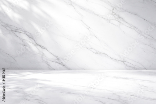 Luxurious white marble backdrop with soft natural daylight shadows, elegant premium background ideal for product presentation, branding, and high-end advertising with generous copy space.