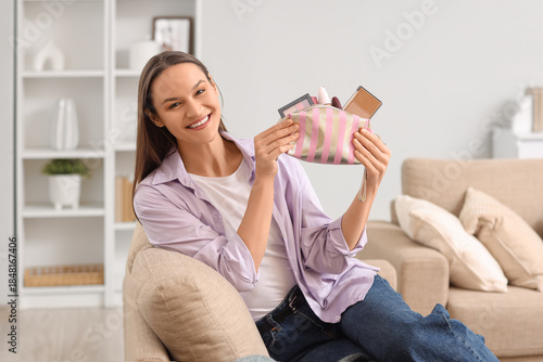 Young woman with cosmetic b...