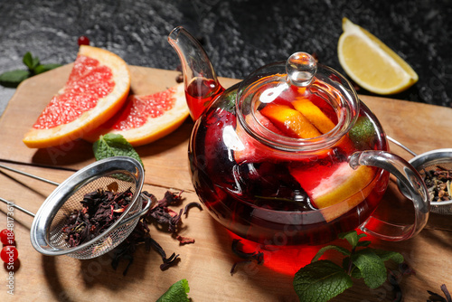 Glass teapot with hot fruit...