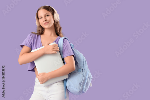 Female student in headphone...
