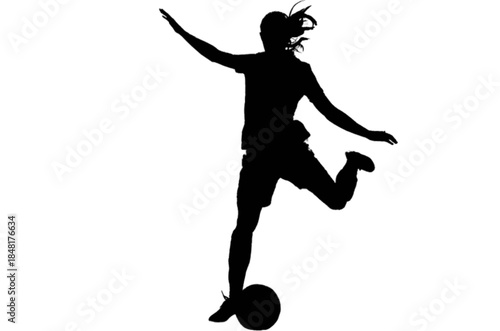 Female soccer player kicking a ball during a match.