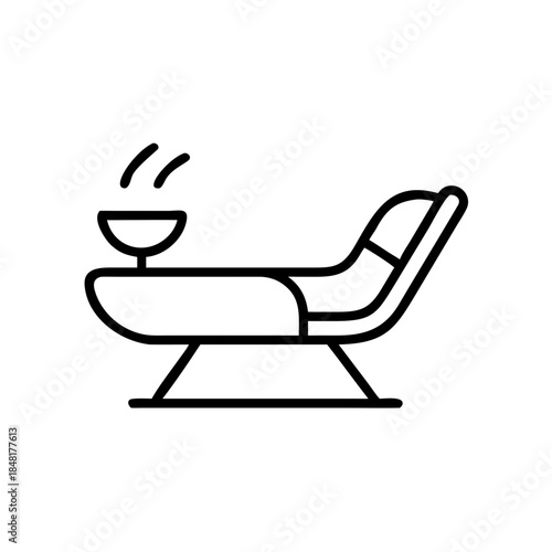 Modern lounge chair with drink symbolizing relaxation in minimalist design  
