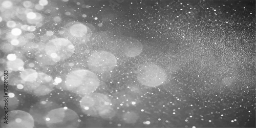 Shiny water drops on a black window texture create a falling snowflake pattern with blue holiday stars for a winter Christmas celebration background