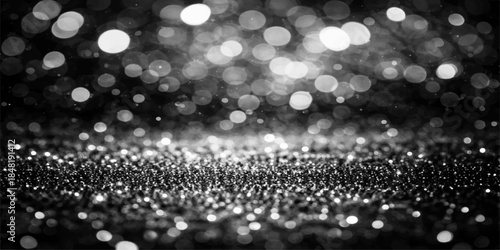 Shiny blue macro texture of aqua water drops on glass featuring bright winter bokeh lights for an abstract holiday Christmas background