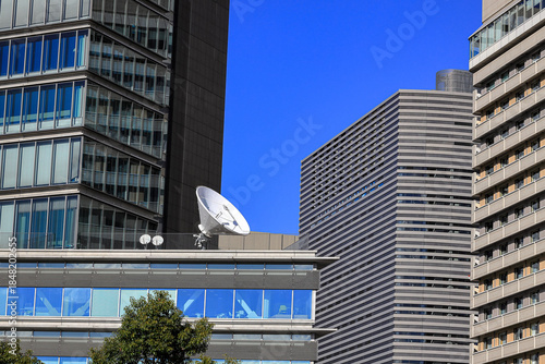 Wallpaper Mural the satellite dish antennas for communication on top of modern skyscraper. Torontodigital.ca
