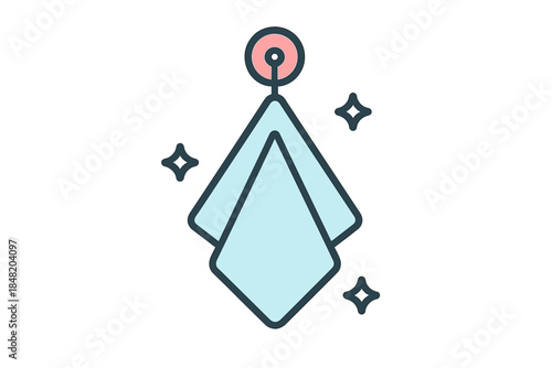 Folded textile hanging on wall hook with shine symbols