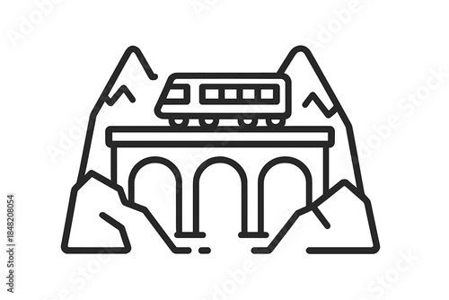 Train crossing a viaduct in mountains